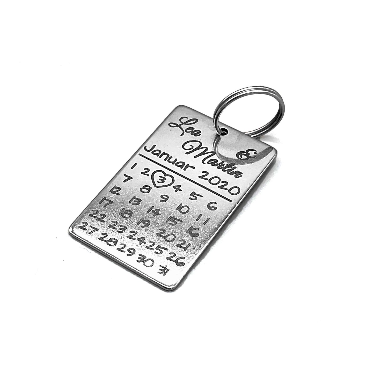 Stainless steel keychain with calendar motif - individual engraving