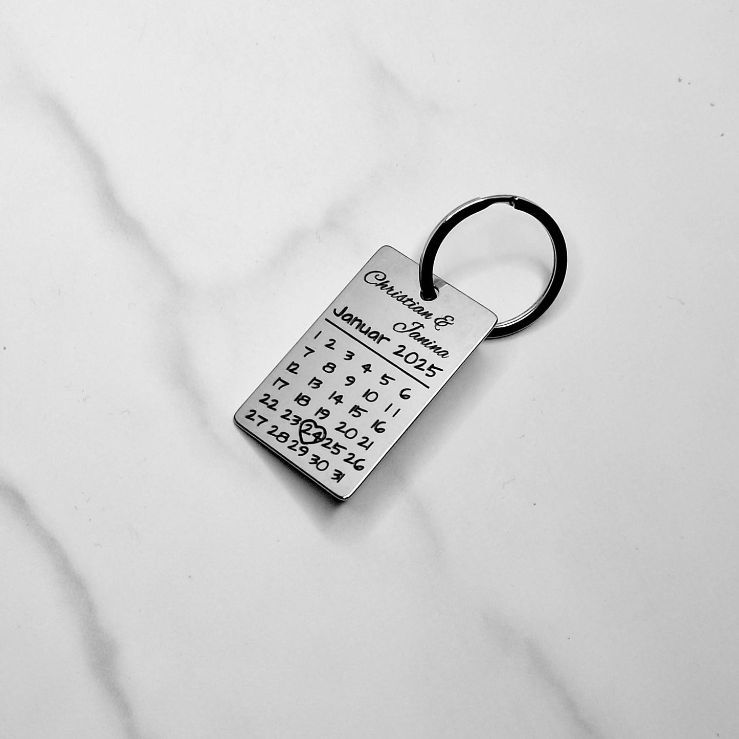 Stainless steel keychain with calendar motif - individual engraving