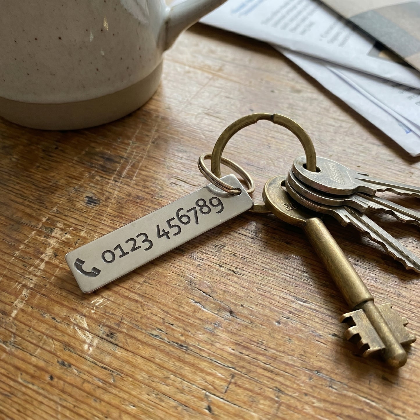 Keyring with laser engraving - telephone number / text engraving